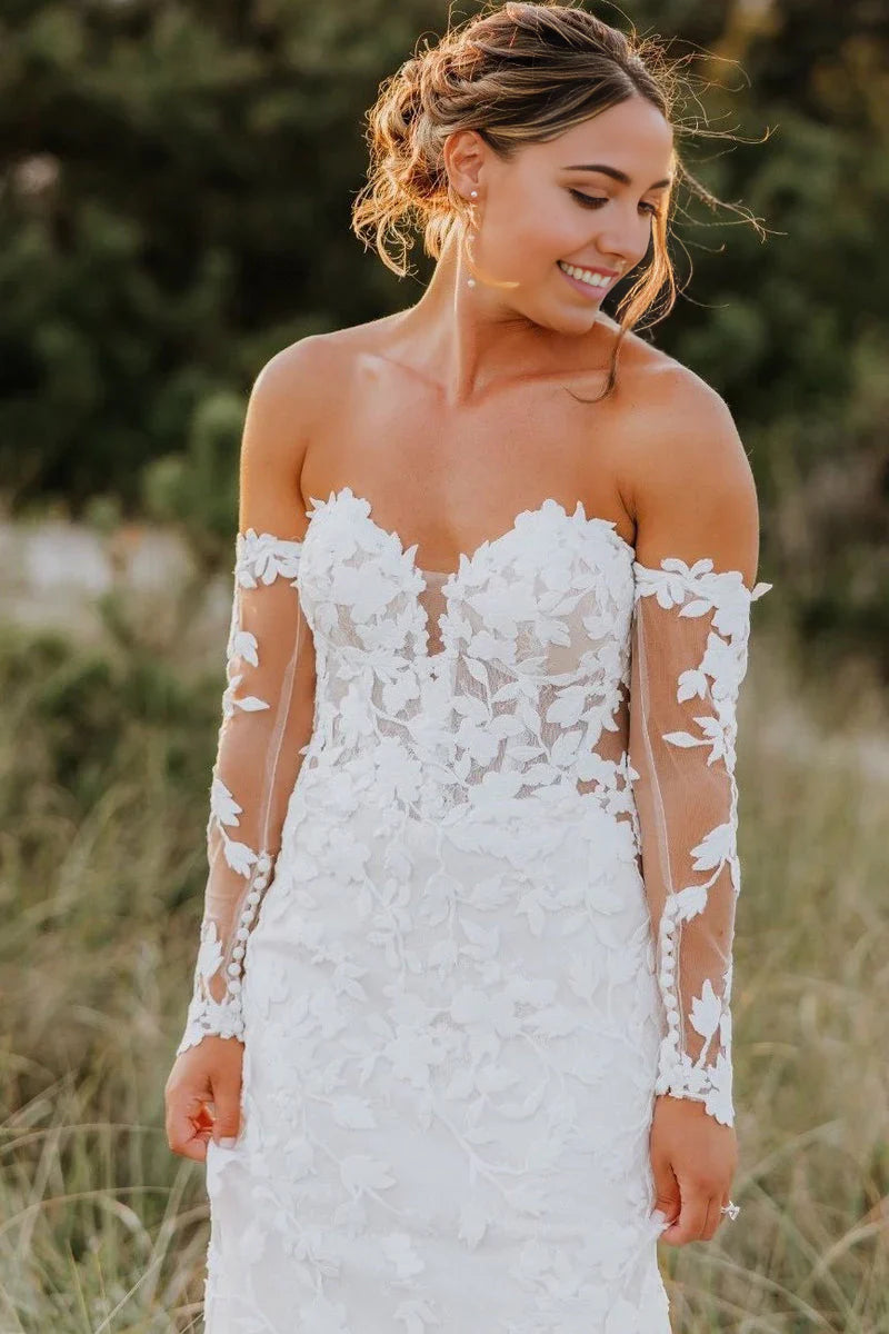 Vestidos de novia de tul con escote corazón y apliques de sirena y mangas